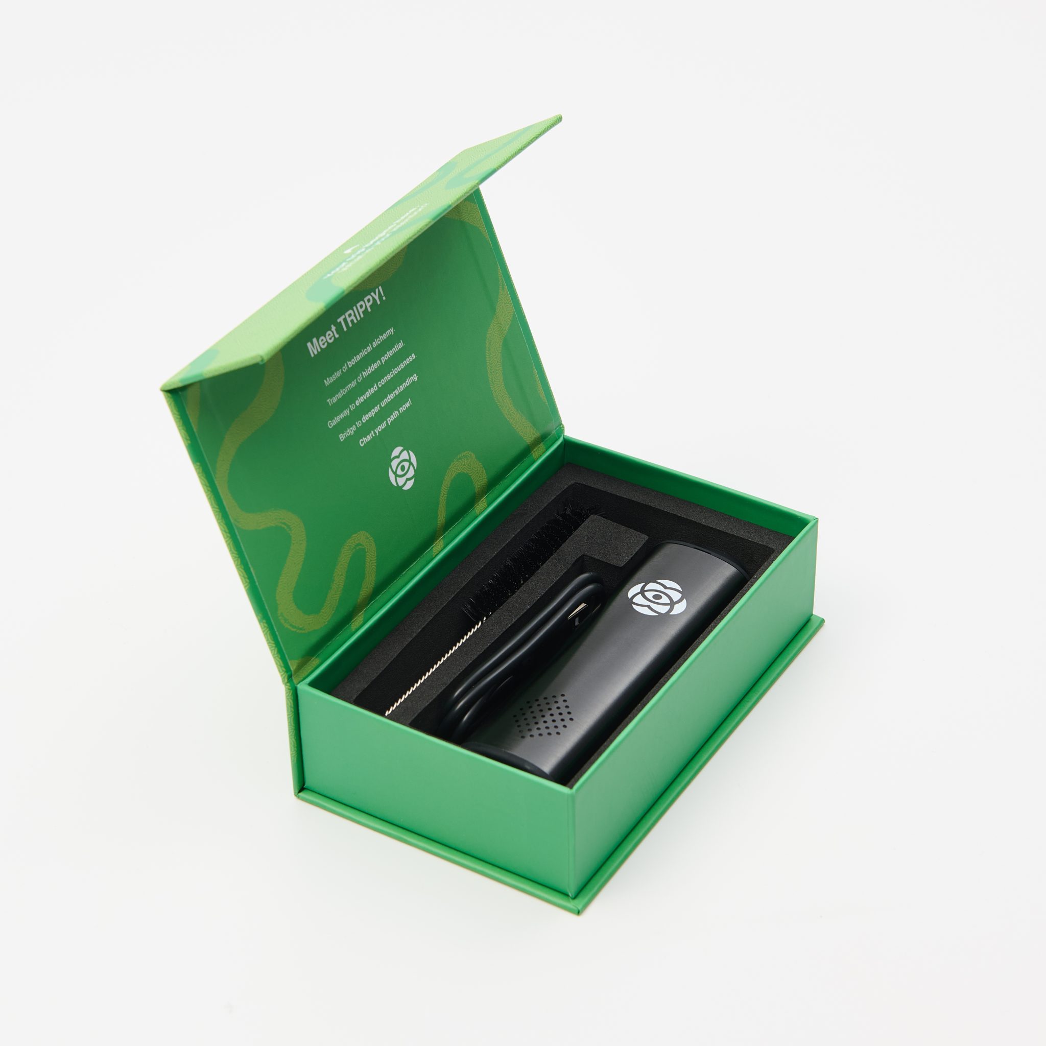 Trippy 2 packaging opened to show the device and included accessories